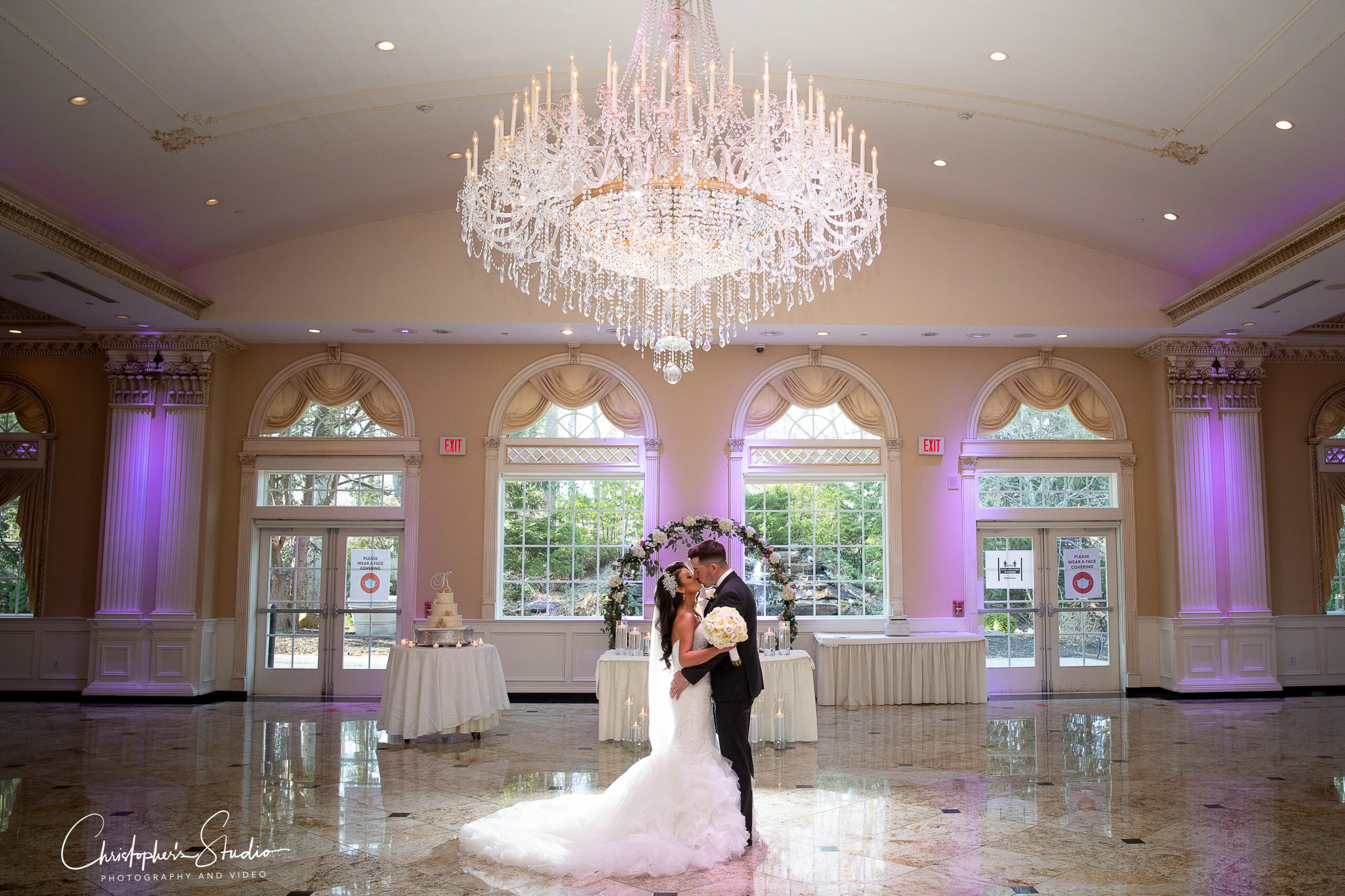 Ballroom photo with bride and groom