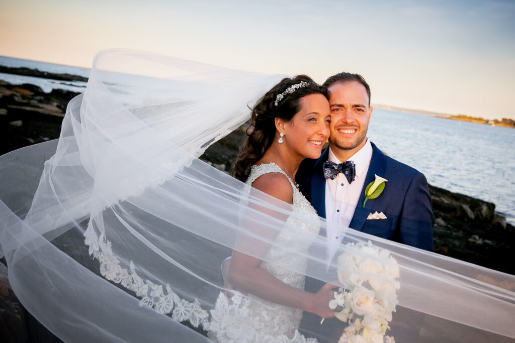 Couple poses for photos during golden hour at the VIP Club.