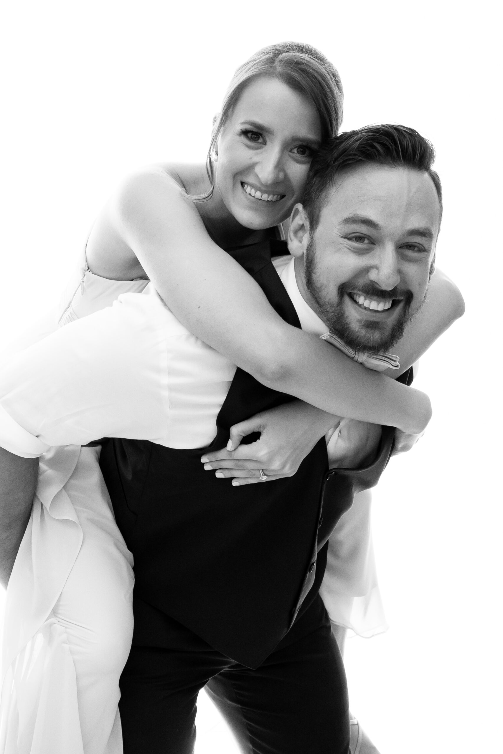 Wedding guests in the photo booth having fun
