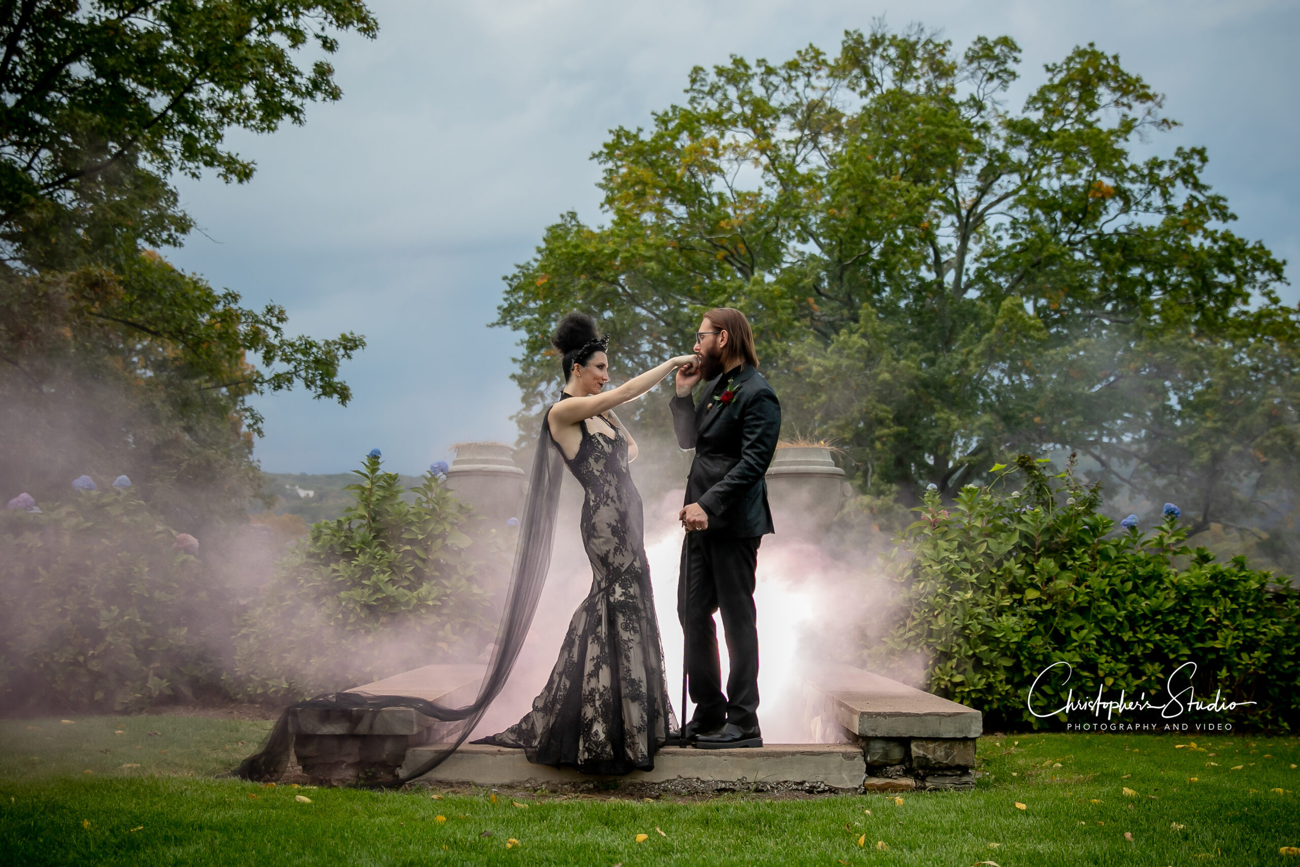 Bride and groom with smoke bomb