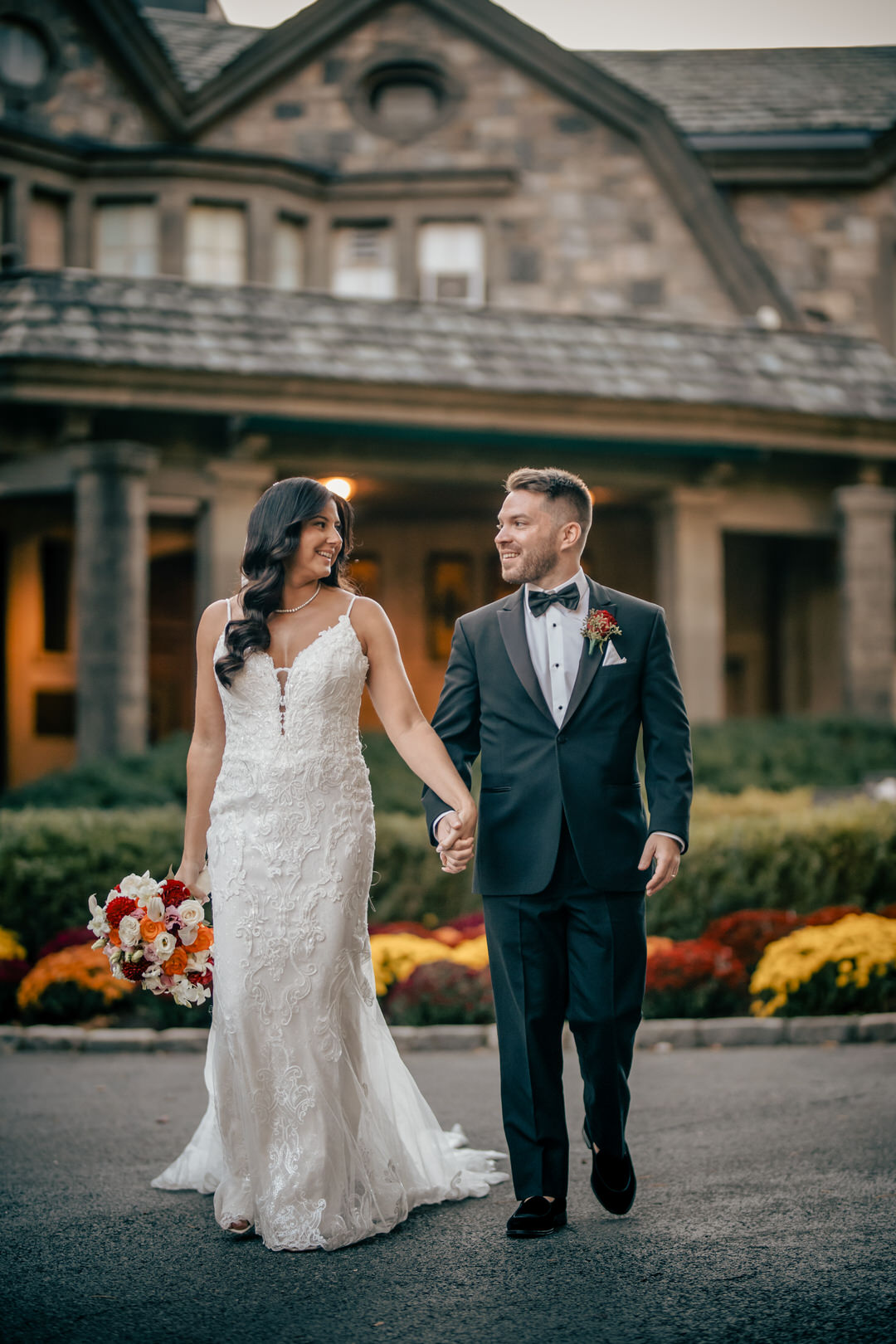 bride and groom walking to the wedding reception